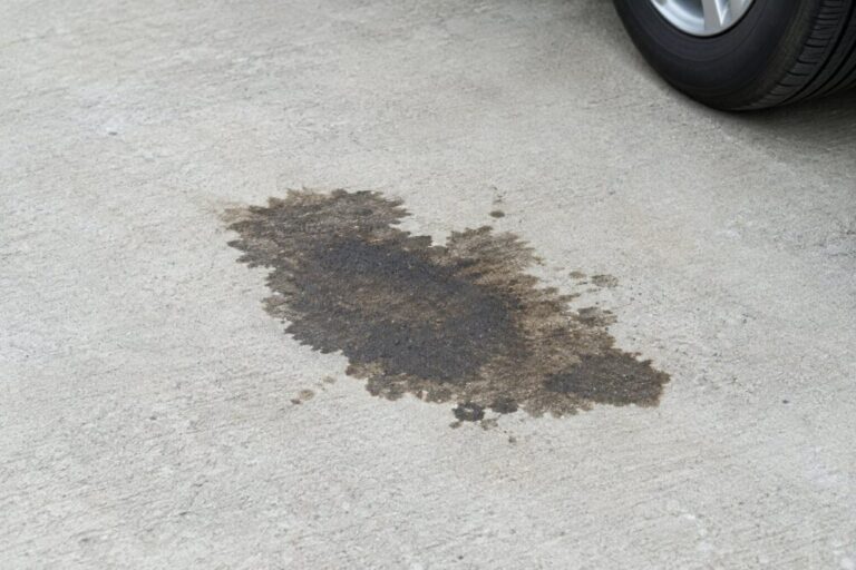Driveway Stain Removal: What Works on Oil, Rust, Algae, and Tire Marks